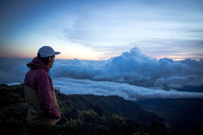 Man on landscape against mountains