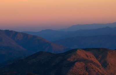 Scenic view of mountains against sky during sunset