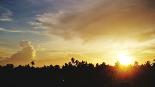 Scenic view of silhouette landscape against sky during sunset