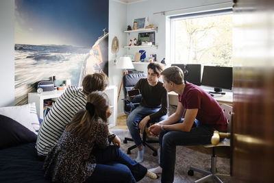 Group of people sitting outdoors