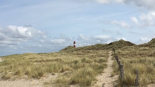 Scenic view of land against sky