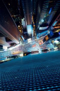 Illuminated buildings in city at night