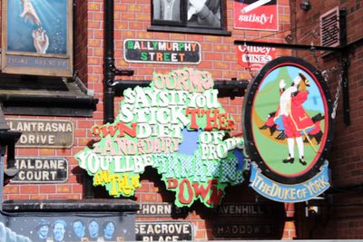 Graffiti on wall with city in background