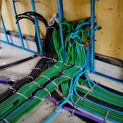 High angle view of multi colored pipes on wall