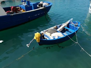 High angle view of boat moored in water