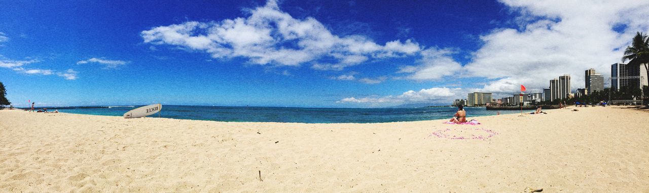 beach, sea, sand, sky, shore, water, horizon over water, cloud - sky, vacations, built structure, building exterior, cloud, leisure activity, architecture, incidental people, nature, scenics, tranquility, day