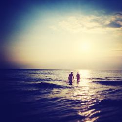 Scenic view of sea at sunset