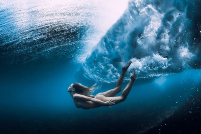 Man swimming in sea