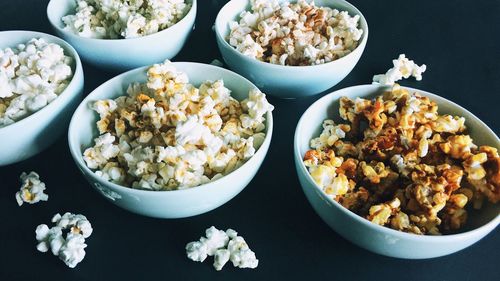 Close-up of popcorns in bowls on table
