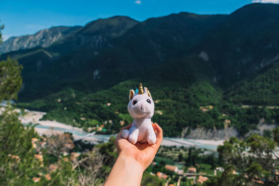 A picturesque wide landscape view of a french medieval village in the alps on a sunny day