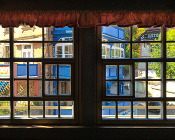 Buildings seen through glass window