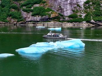 Scenic view of boats in lake