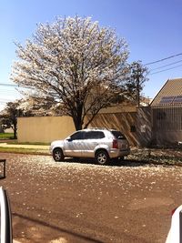 Cars on road against sky