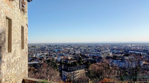 Cityscape against clear sky