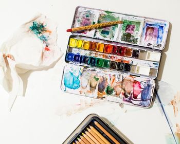 High angle view of paintbrushes on table