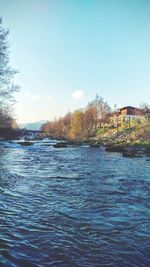 Scenic view of river against sky