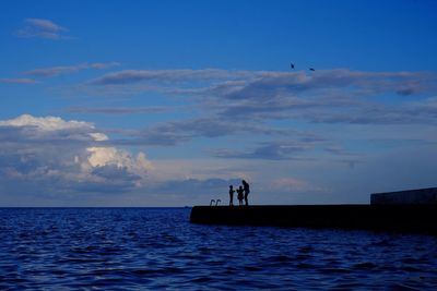 Scenic view of sea against sky at sunset