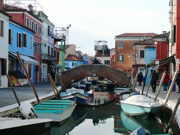 Boats moored at canal