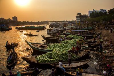 Boats moored at harbor