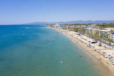 High angle view of beach against blue sky