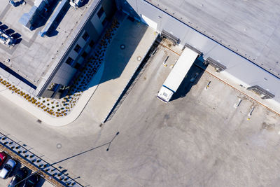 High angle view of truck parked by building