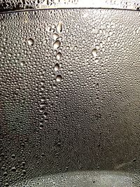 Close-up of water drops on glass