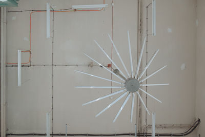 Directly below shot of ferris wheel in building