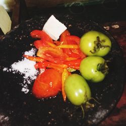 High angle view of chopped tomatoes in plate