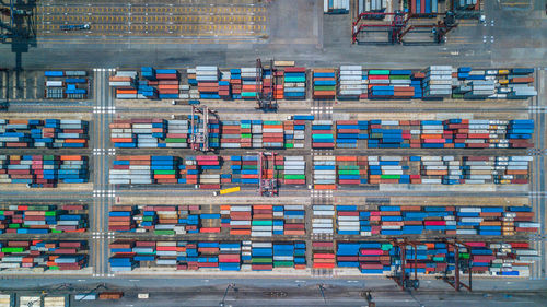 High angle view of container ship at commercial dock