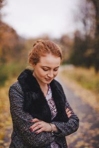 Young woman standing outdoors