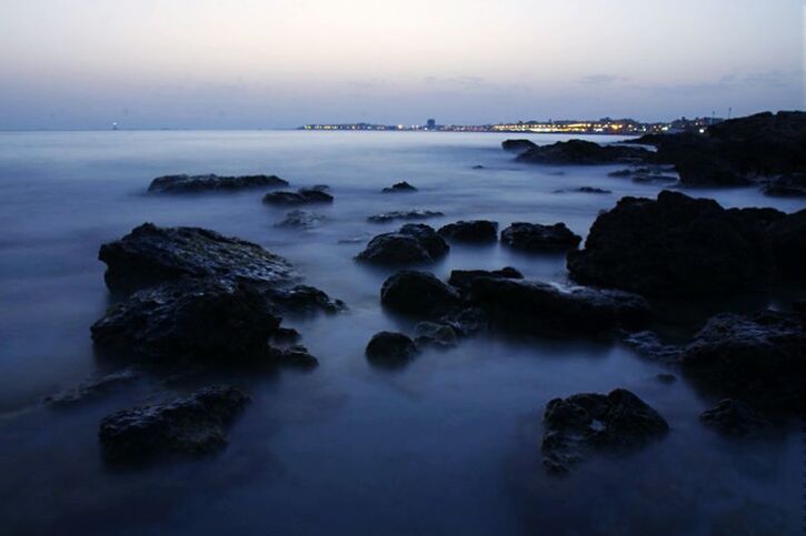 water, sea, scenics, beauty in nature, tranquil scene, tranquility, rock - object, nature, horizon over water, sky, wave, idyllic, rock formation, waterfront, shore, rock, surf, outdoors, no people, dusk