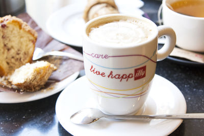 Close-up of cappuccino served on table