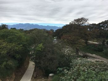 Scenic view of mountain road against sky