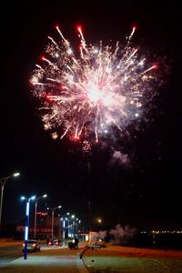 Firework display at night