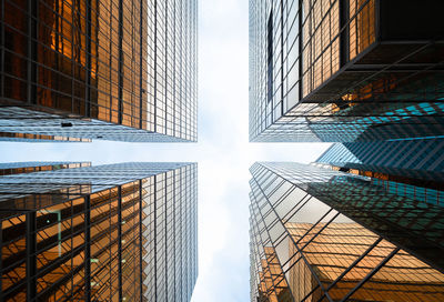 Low angle view of modern buildings against sky