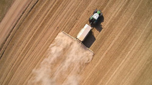 High angle view of person working on field