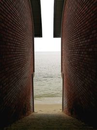 Sea shore against sky