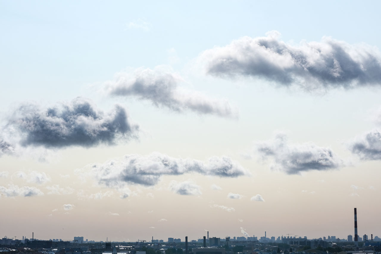 LOW ANGLE VIEW OF BUILDINGS AGAINST SKY