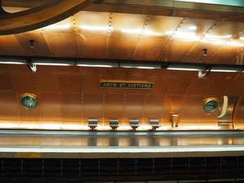 Low angle view of illuminated lights at railroad station