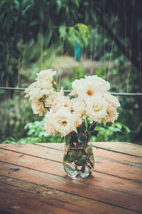 Close-up of white flower vase on table