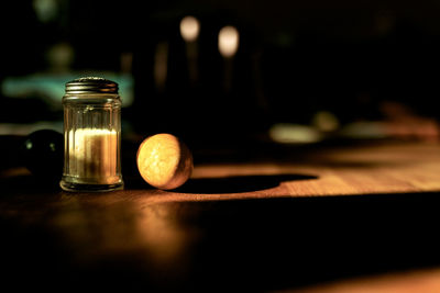 Close-up of glass jar on table