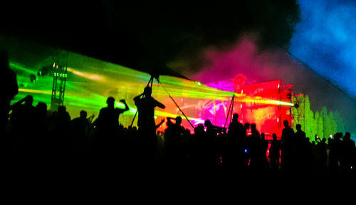 Rear view of people looking at music concert