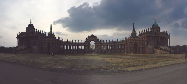 Built structure against cloudy sky