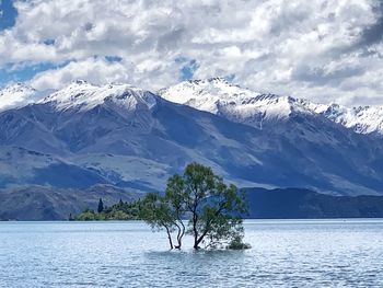 Scenic view of snowcapped mountains against sky