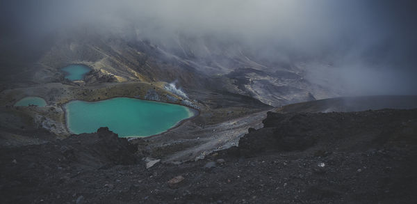 Smoke emitting from volcanic mountain