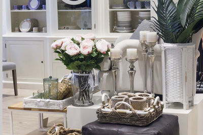 Flower vase on table at home