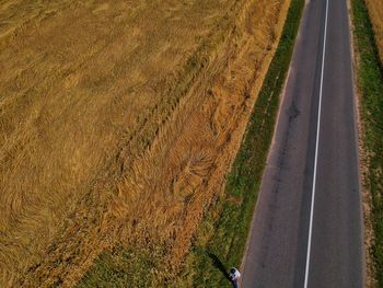 High angle view of road amidst field