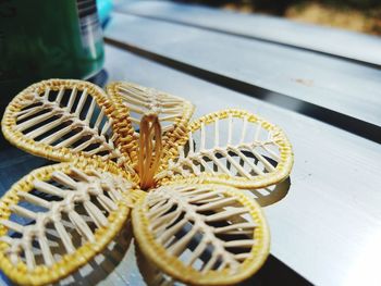 Close-up of fork in plate on table