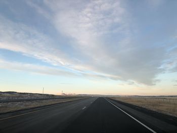 Road against sky during sunset