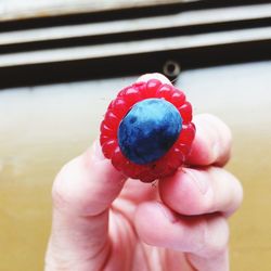 Cropped image of person eating food